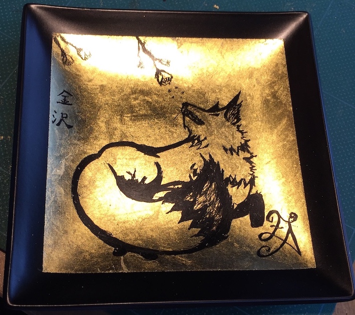 Gold Leaf Fox chasing a flower