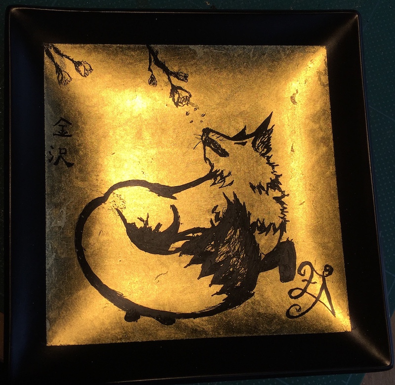 Gold Leaf Fox chasing a flower